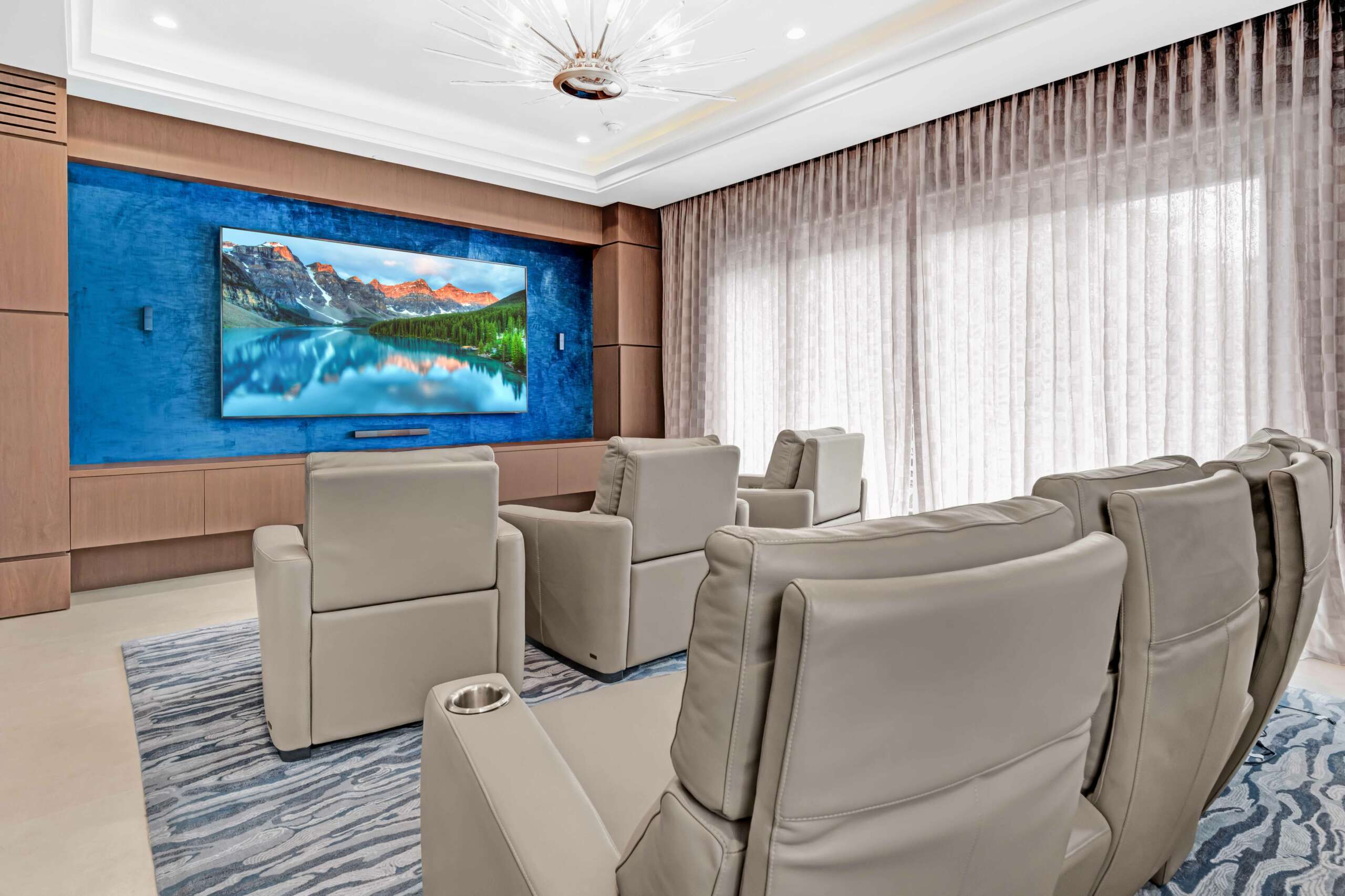 The screen in the home cinema is over 100 inches wide