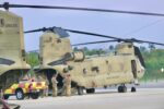 Military helicopters touch down in Cayman for refuelling stop