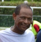 Man accused of jury tampering in football corruption case