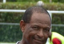 Man accused of jury tampering in football corruption case