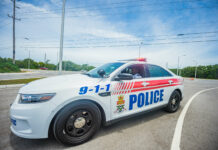 Two arrested after police recover drugs and ammunition RCIPS police car - Photo: Taneos Ramsay