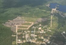Developer carries out unauthorised land clearing by proposed road extension This aerial image shows the cleared land site in Frank Sound. - Photo: Planning document