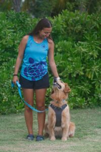 Samanatha Gunby and Bell, Cayman's sea turtle detection dog