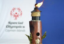 Bocce torch carved with ‘essence of Cayman wrapped in it’