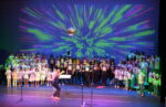 Cayman Youth Choir brings back the 70s in ‘Mamma Mia!’ showcase The Cayman Youth Choir fill the Harquail Theatre with timeless hits by Queen and ABBA for a showcase of 'Mamma Mia!'. - Photo: Shanda Gallego