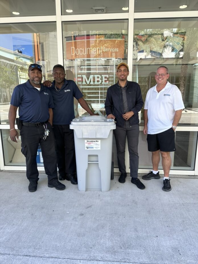 Cay-Shred Manager, Mr Timothy Dailey, (far right) and MailBoxes Etc Senior Associate, Mr Atlas Ramoon, are joined by Cay-Shred employees (from left) Al Shields and Ainsley Hall as they launch the MBE/Cay-Shred service partnership.
