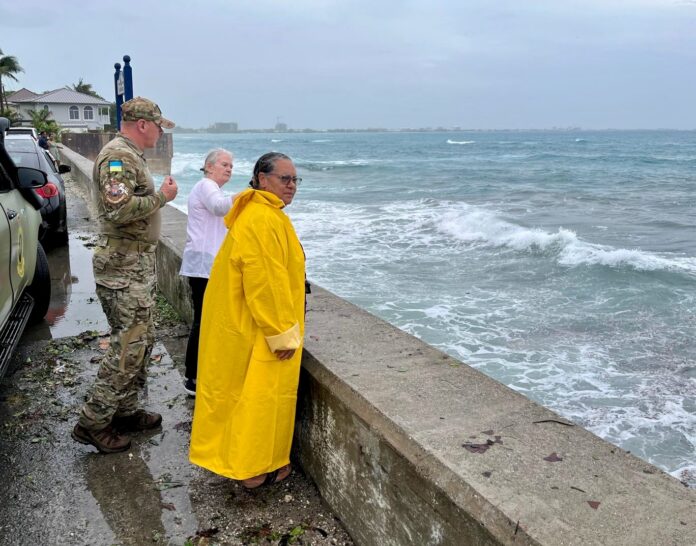 Premier Juliana O'Connor Connolly and Governor Jane Owen survey the scene after Beryl's passage on Thursday. - Photo: GIS