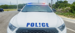 Man turns up at hospital with ‘serious’ wounds RCIPS police car
