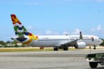 Tourists pack evacuation flights as airport closure looms