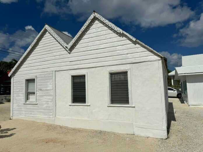A side view of the Herbert Parsons' House shows the two parts of the house, the original wattle-and-daub construction and the modern addition, which has since been removed. - Photo: Submitted