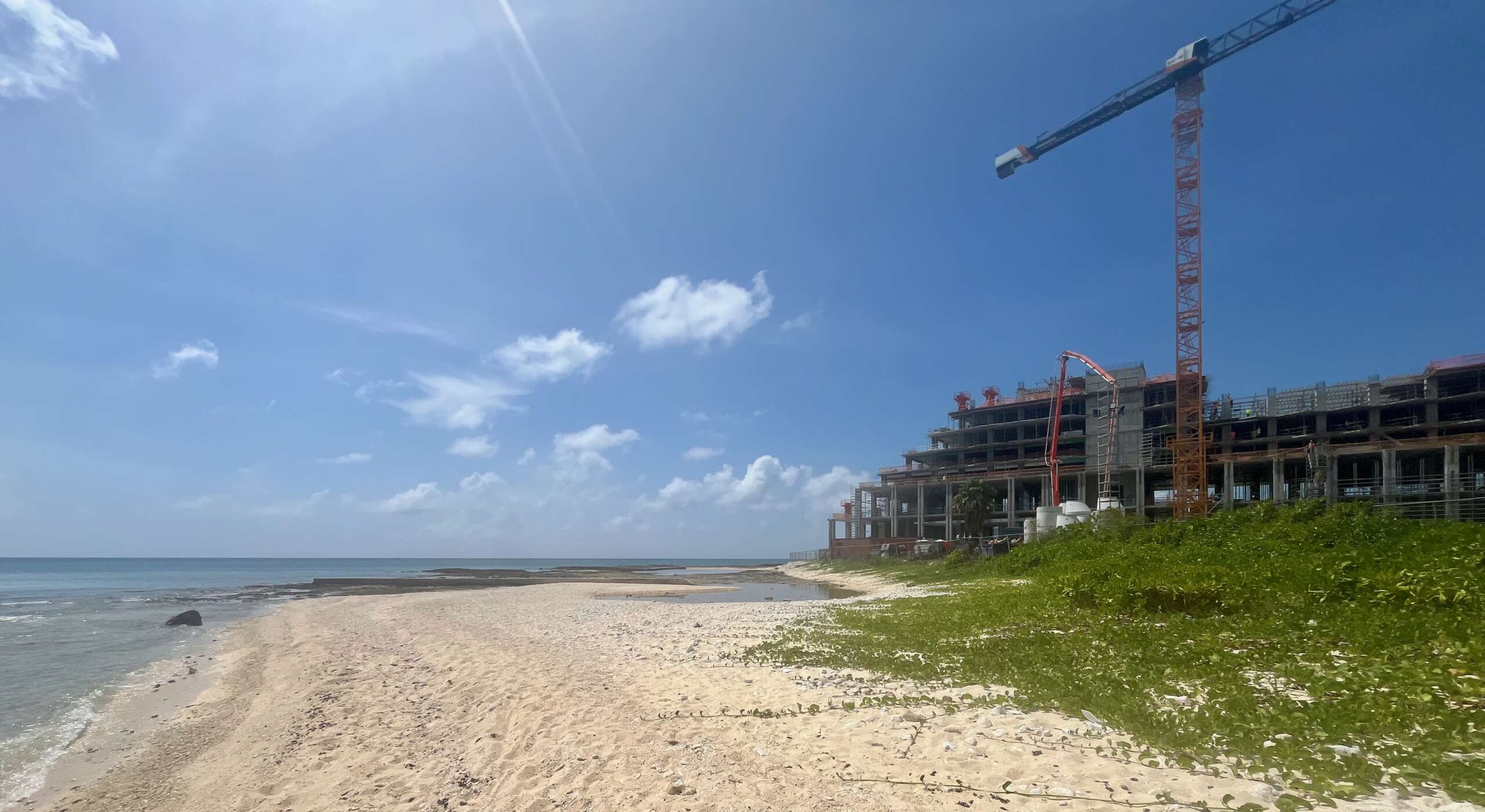 The Grand Hyatt, currently under construction, is at the southern end of Seven Mile where the coastline bends towards George Town.
