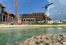 Grand Hyatt developer plans water sports dock on Seven Mile The coastline around the half-built Grand Hyatt resort is part sandy beach, part shallow pools and part ironshore. - Photos: James Whittaker