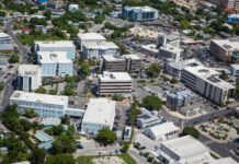 Financial services activity, fee increases boost government surplus