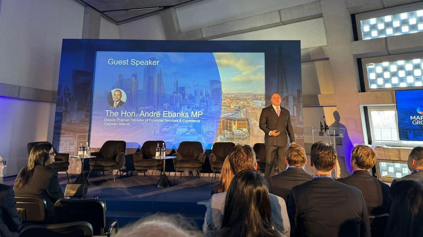 Deputy Premier Andre Ebanks speaks  at the Maples London Investment Funds Forum 2024. - Photo: Supplied
