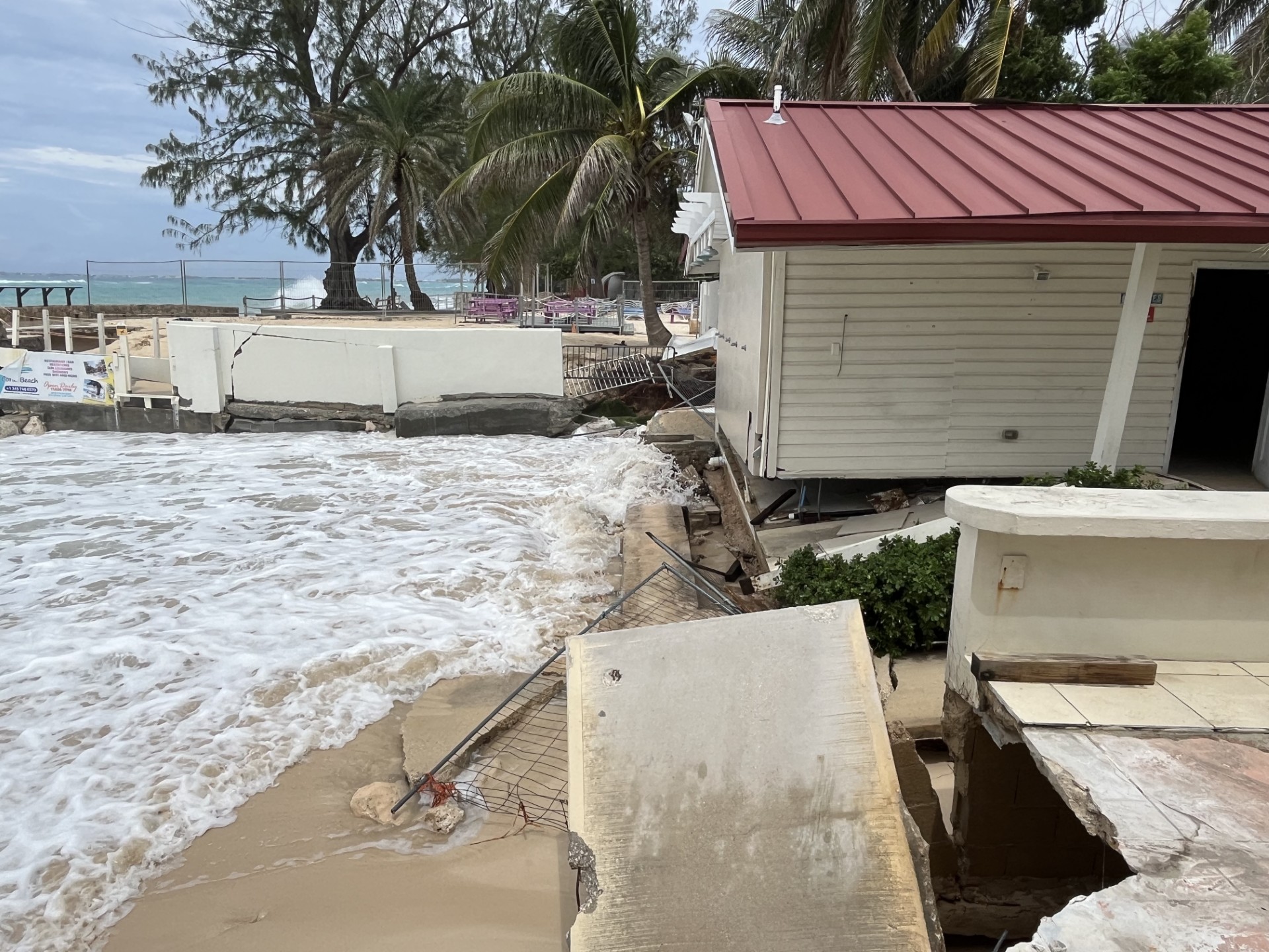 A structure at the Royal Palms has been undermined by the waves