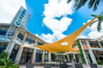 Police probe Camana Bay disorder