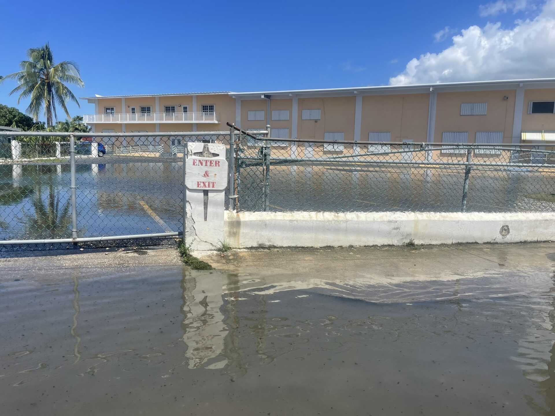 Standing water due to high tides on Bronze Street in George Town last week