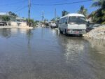 Schools closed Monday as public warned to expect flooding Standing water due to high tides on Bronze Street in George Town last week