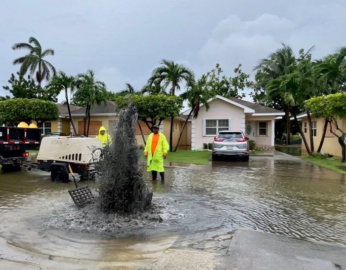 Engineers clear drains in George Town, Wednesday, to manage flooding. The NRA says a national strategy is needed to better manage storm water. - Photo: Sarah Bridge