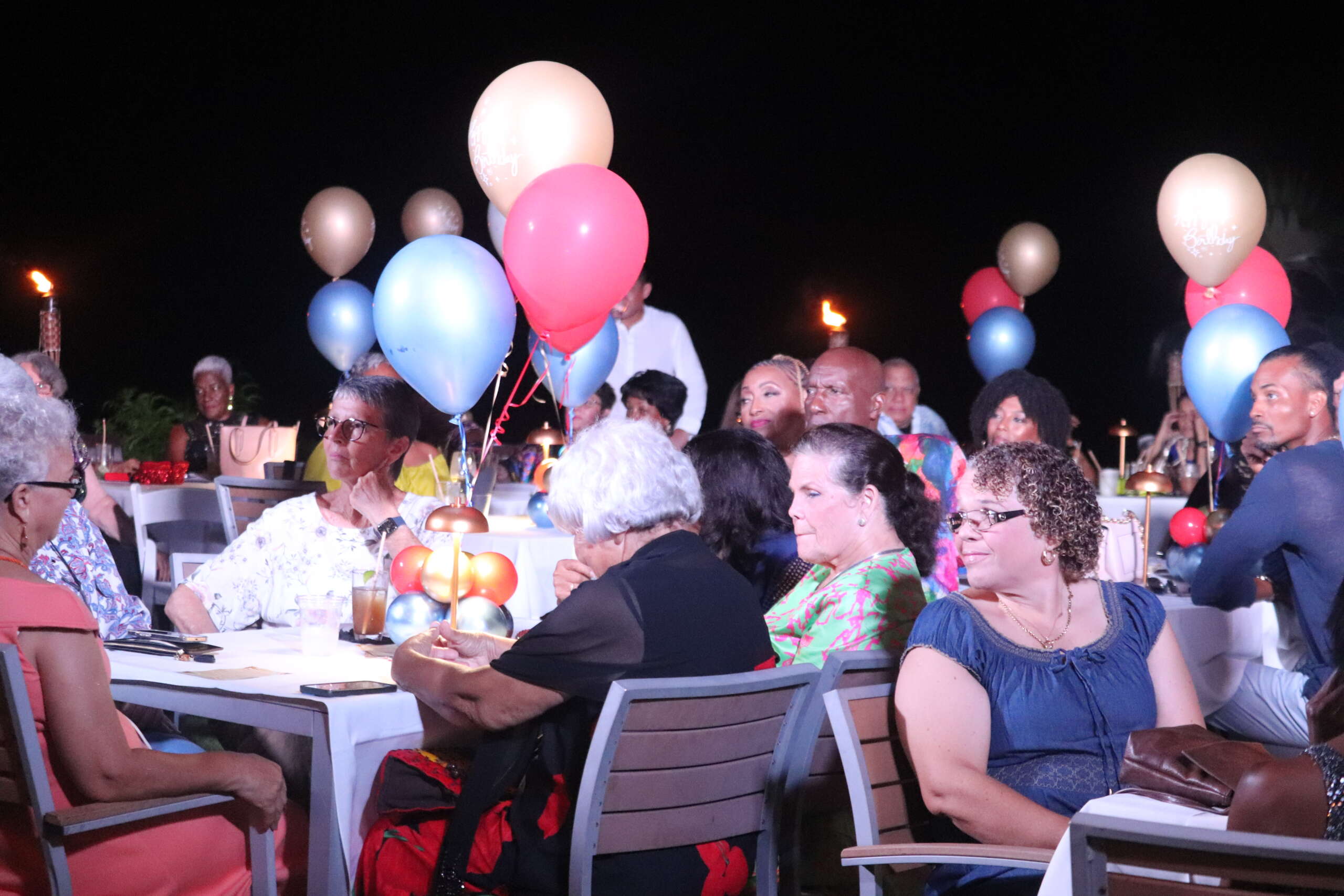 Close family, friends and associates gather to celebrate Lucille Seymour's 80th birthday. - Photo: Shanda Gallego
