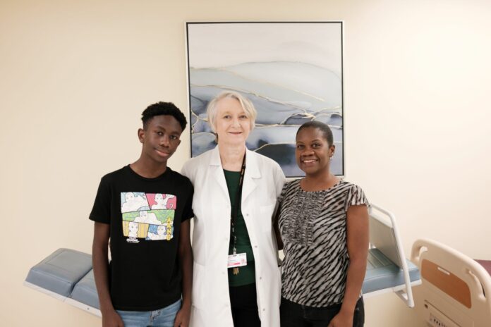 1. 14-year-old patient Jordan Stewart, his mother Antonette McFarlane and HSA Cardiologist, Dr Joanna Kregiel.