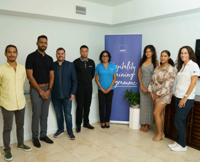 Fourth from the left, Le Soleil d’Or intern, Tad McFarlane, Dianne Conolly, hospitality programme manager, Le Soleil d’Or interns Litzy Walton-Valera and Jia Hydes, stand with members of the Le Soleil d’Or management team and key Dart staff.