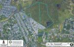 Planning board approves former chairman’s $7.5M subdivision This image shows the two parcels of land, highlighted in light blue, on which A. L. Thompson plans to develop affordable housing in Savannah. - Photo: UK Hydrographic Office 2021 aerial image
