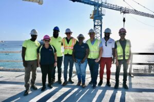 NCB Group’s hotel project team celebrating the roof topping at Kailani Grand Cayman 