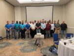 Rubis Hosts Oil Spill Training Left to right. Marnus Ehlers (Rubis),Dustin Kersey (Rubis), Ellington Forbes (NRA), James Herbert (NRA), Richard Simms (DEH), Nathan Dack (Regiment), Chris Rivers (NRA), David Broughton (HMCI), Roy Charlton (RCIFS), Brad Hunt (Rubis), D. Randy Rankin (RCIFS), Ian Yearwood (RCIPS), Matthew Simmons (OSRL), Tim Austin (DOE), Andres Barthel (Rubis, front), Martin Vander Touw (DOE, back), Windell Scott (NRA), Sean Haye (NRA), Corey Nelms (NRA), Stacie Sybersma (Ministry of Health), Michael Hernandez (OSRL), Brian Chin Yee (NRA), Gregory Campeau (Rubis). Not pictured: Robert Scotland (CICG), Aliya Dunstan (HMCI).