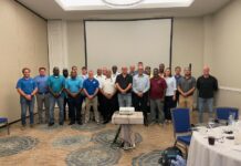 Rubis Hosts Oil Spill Training Left to right. Marnus Ehlers (Rubis),Dustin Kersey (Rubis), Ellington Forbes (NRA), James Herbert (NRA), Richard Simms (DEH), Nathan Dack (Regiment), Chris Rivers (NRA), David Broughton (HMCI), Roy Charlton (RCIFS), Brad Hunt (Rubis), D. Randy Rankin (RCIFS), Ian Yearwood (RCIPS), Matthew Simmons (OSRL), Tim Austin (DOE), Andres Barthel (Rubis, front), Martin Vander Touw (DOE, back), Windell Scott (NRA), Sean Haye (NRA), Corey Nelms (NRA), Stacie Sybersma (Ministry of Health), Michael Hernandez (OSRL), Brian Chin Yee (NRA), Gregory Campeau (Rubis). Not pictured: Robert Scotland (CICG), Aliya Dunstan (HMCI).