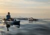 Conquering jellyfish and sharks: Historic swim around Little Cayman highlights urgency of climate change