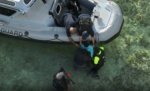 Multiple people hurt in standoff involving knife-wielding female suspect This RCIPS image shows the moment police detained a female suspect after a nearly three-hour-long standoff in George Town. - Photo: Submitted