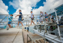 Cayman’s cruise passengers spend US$116 each onshore, report claims Cruise ship passengers arrive on shore at George Town. - Photo: File
