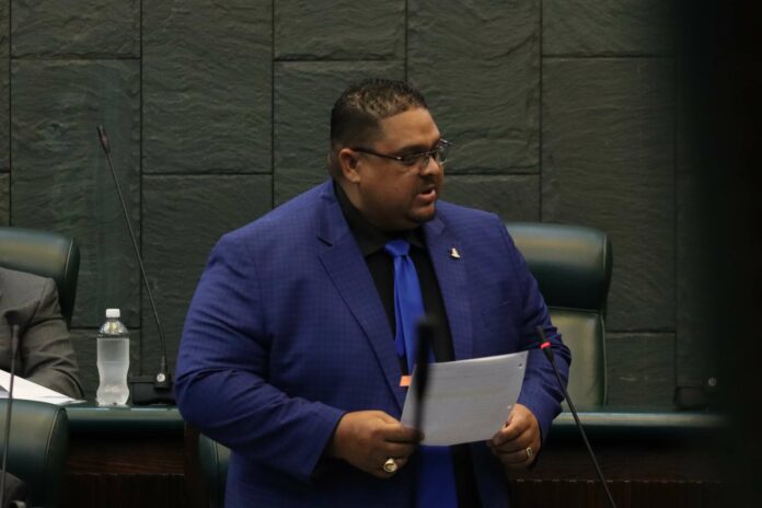 Housing Minister Jay Ebanks addressing Parliament