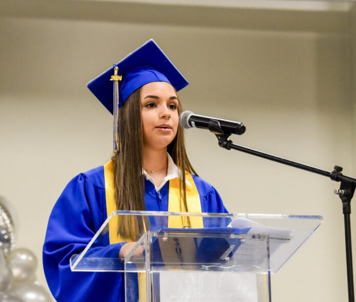 Student Raeann Matute-Scott delivers the salutatory address.