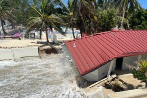 The Royal Palms property is battered by waves on Wednesday. - Photo: Simon Boxall