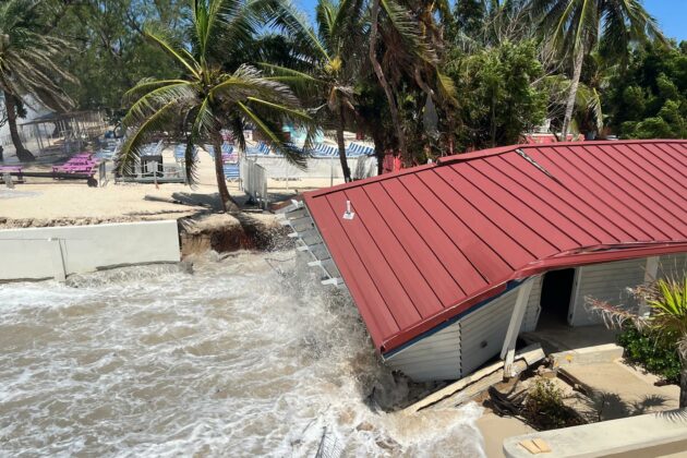 The Royal Palms property is battered by waves on Wednesday. - Photo: Simon Boxall