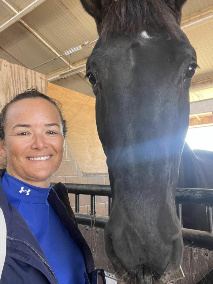 Jessica McTaggart poses with horse Jamrock at Rancho St. Vincent in Mexico. - Photo: Supplied