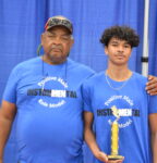 Grandfather-grandson duo claim domino championship