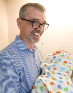Baby Ella with Dr. Robert Bomont