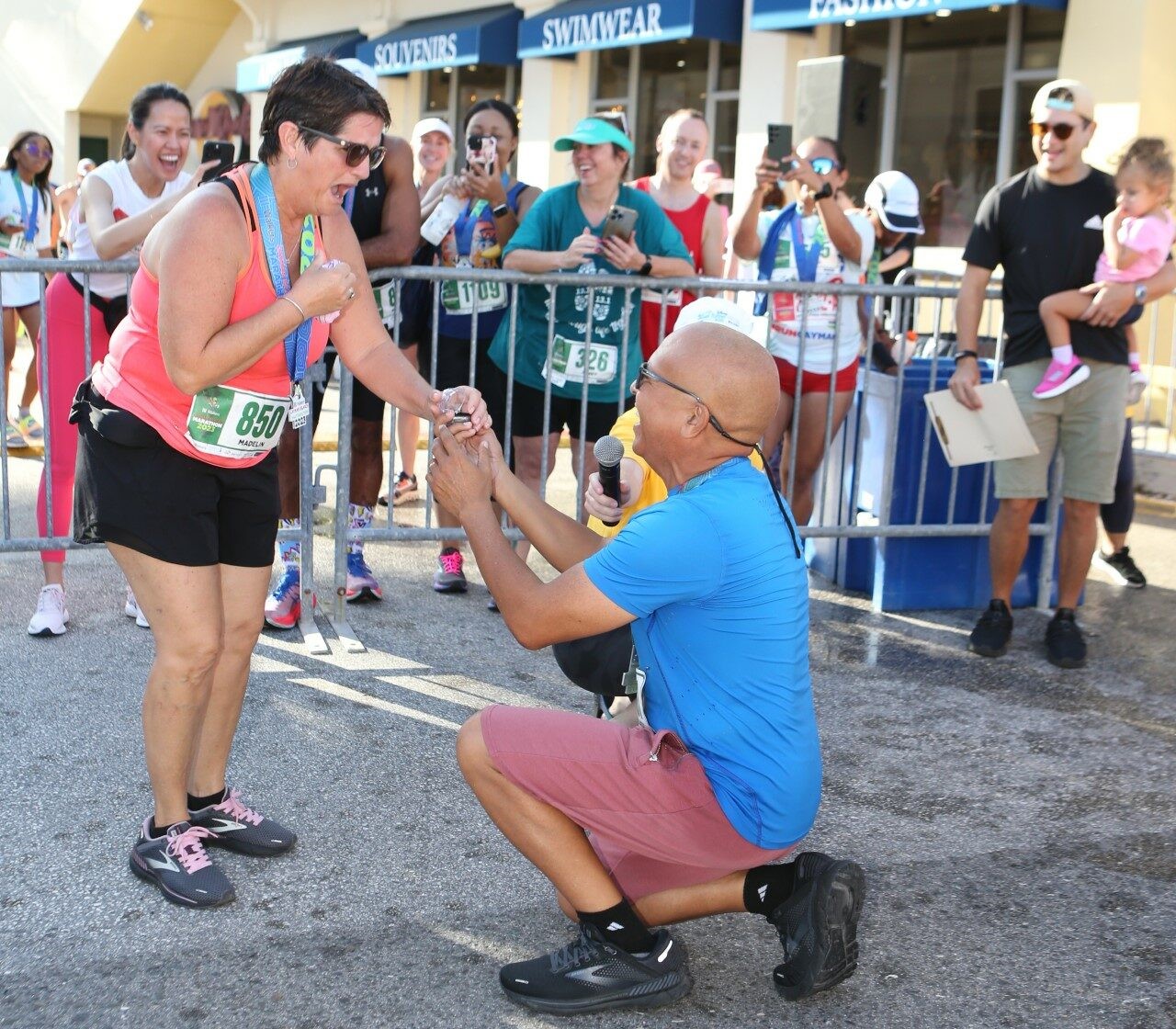 Gerardo Dominguez proposed to Madelin Mora on the finishing line at the 2023 Cayman Islands marathon