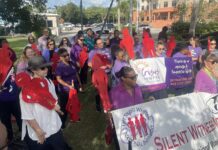 Politicians urge action on domestic abuse after Silent Witness March Campaigners at the start of the 24th Annual Silent Witness Walk against gender-based violence