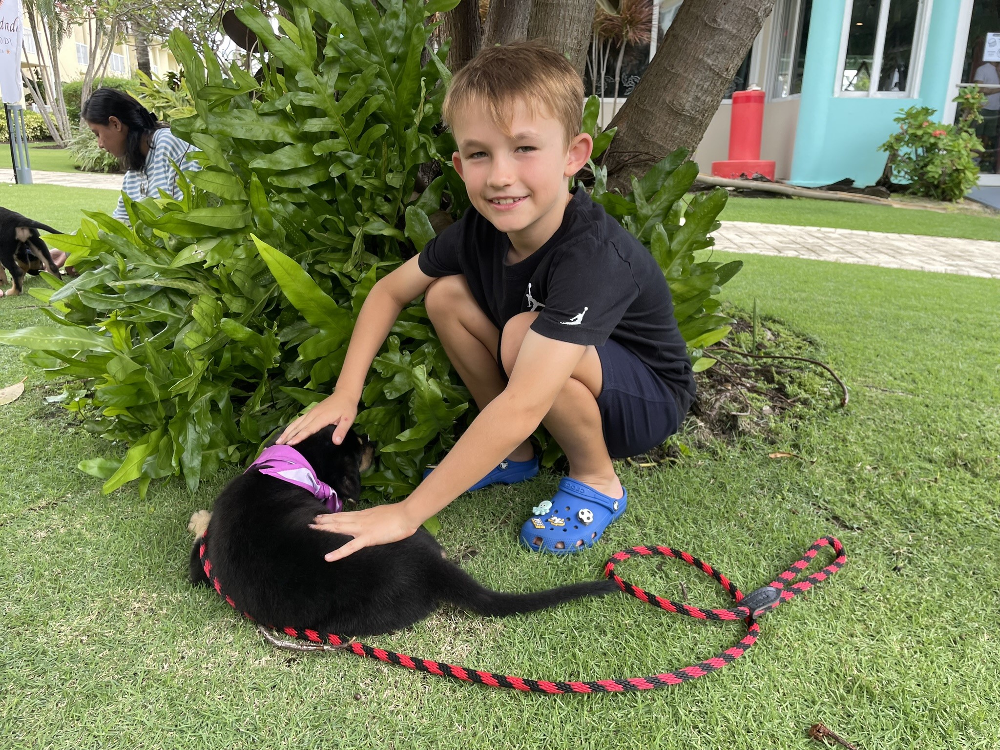 Wesley Fleming with one of the seven puppies at the event