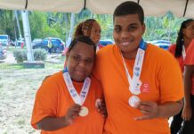 Cayman Special Olympians earn medals at regional games Cayman Special Olympics athletes’ Anechell Newman and Shanike Ebanks competed at the 2024 Caribbean Regional Beach Games. – Photos: Supplied