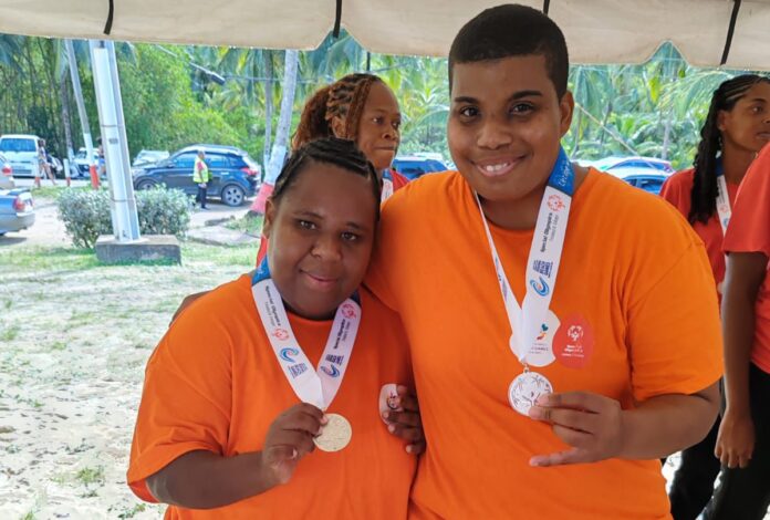 Cayman Special Olympics athletes’ Anechell Newman and Shanike Ebanks competed at the 2024 Caribbean Regional Beach Games. – Photos: Supplied