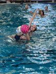 Cayman’s first water polo team returns home with ‘lessons, not losses’ The Cayman girls water polo team is seen in action during the Battle of the Bay tournament in Florida. – Photos: Supplied