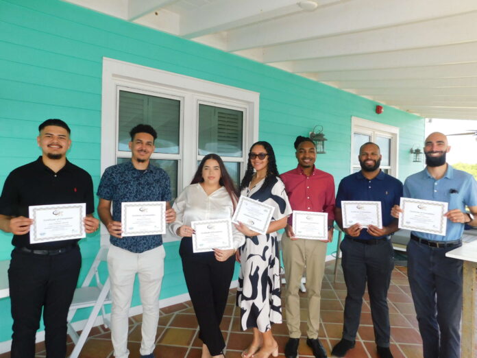 DSCN2795 ATC Trainees Jose Delgado Macias, Duncan Anderson, Nasandra Tibbetts, Lauryn Bennette, Anthony Mendez Jr, Stephen Ebanks and Maxwell Johnson receive their certificates.
