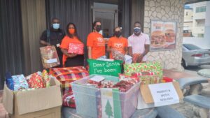 Meals on Wheels CEO, Jennifer West at previous 'Santa For Seniors' gift drives (1)