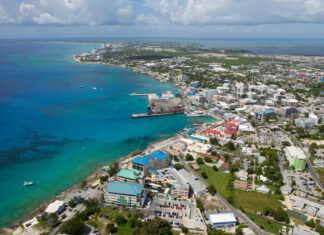 Middle East crisis sends tourism spillover toward Cayman Aerial view of coastline of Grand Cayman, Cayman Islands ,Caribbean