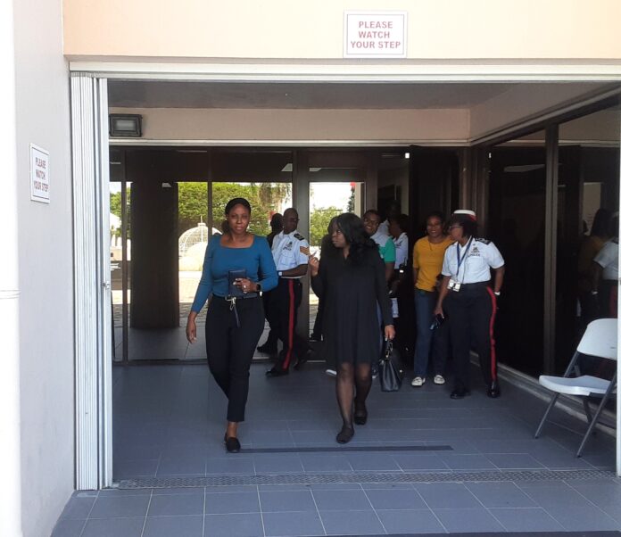 Police sergeant Keren Watson (left) walks free from court with her defence counsel Amelia Fosuhene. - Photo: Raymond Hainey